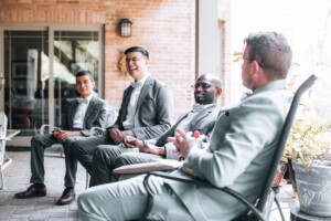 Groomsmen having a laugh and celebrating the big day
